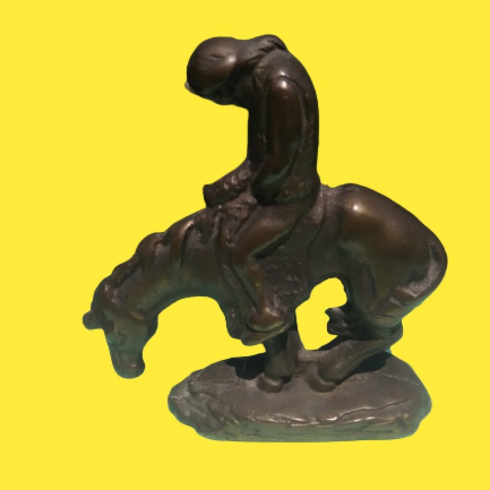 Very solid heavy metal bookend End of Trail horse and rider